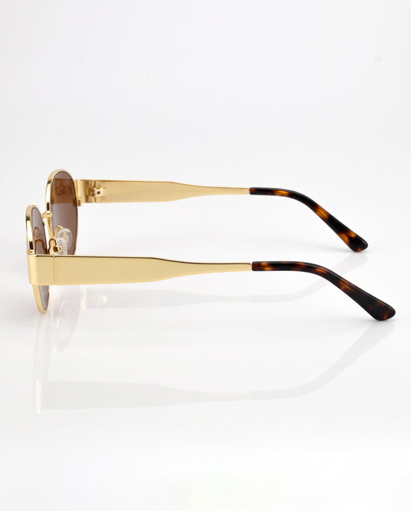 ADRIANA GOLD BROWN - Red Raven